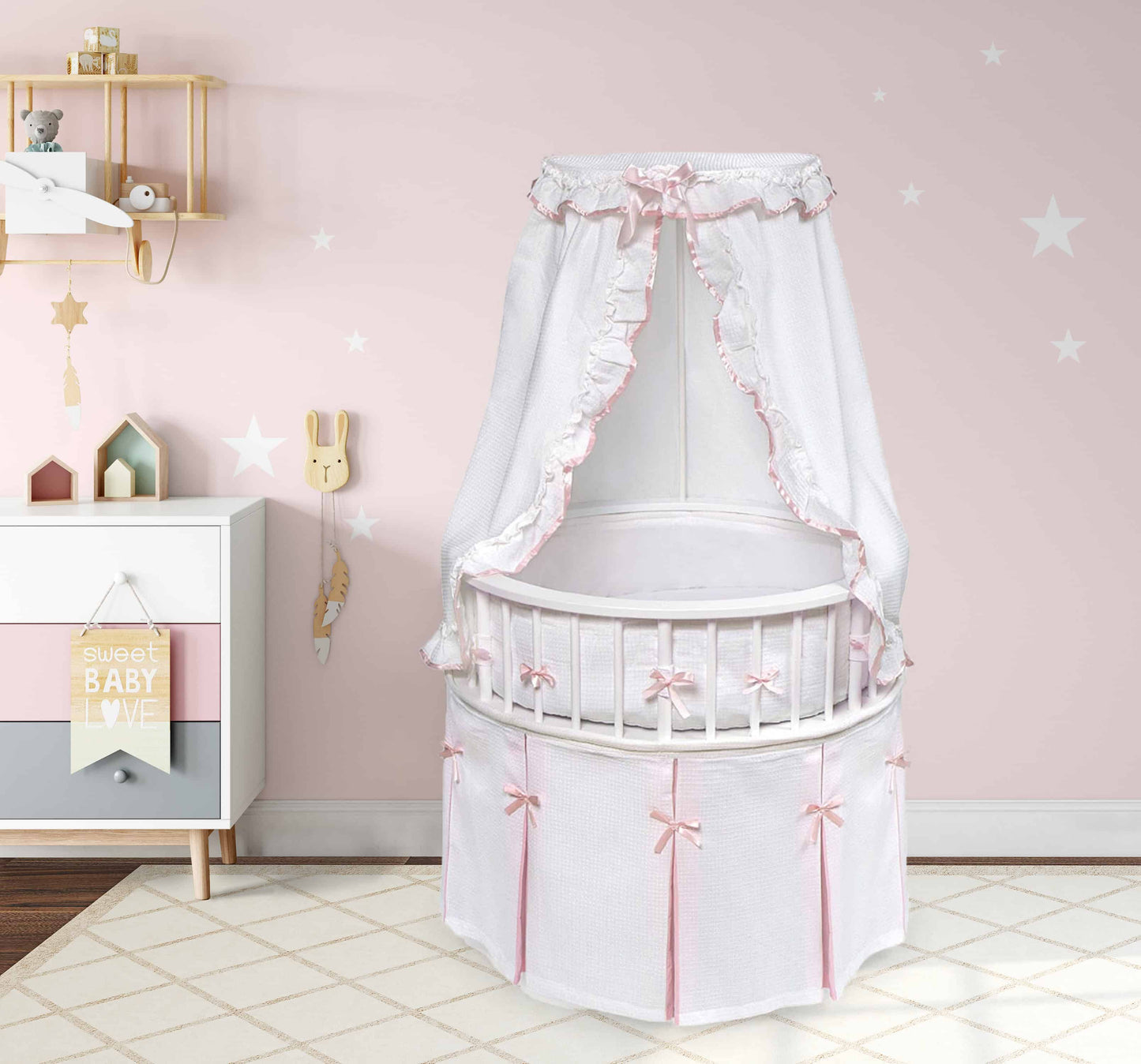 Elegance Round Baby Bassinet with Canopy - Lifestyle Image of Elegance Round Baby Bassinet with Canopy Pink
