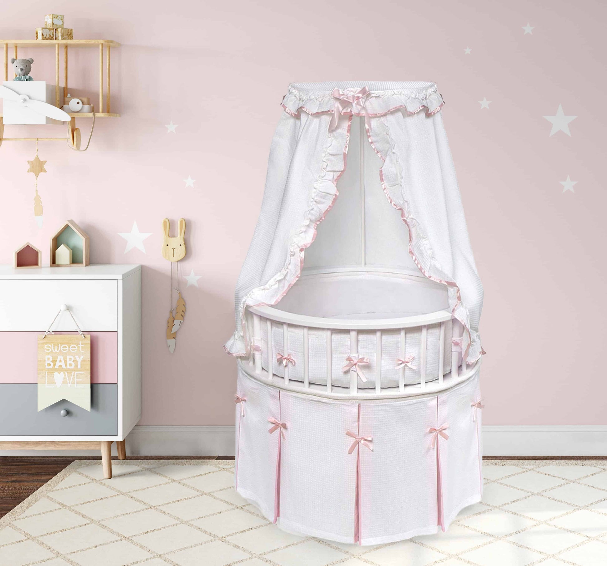 Elegance Round Baby Bassinet with Canopy - Lifestyle Image of Elegance Round Baby Bassinet with Canopy Pink