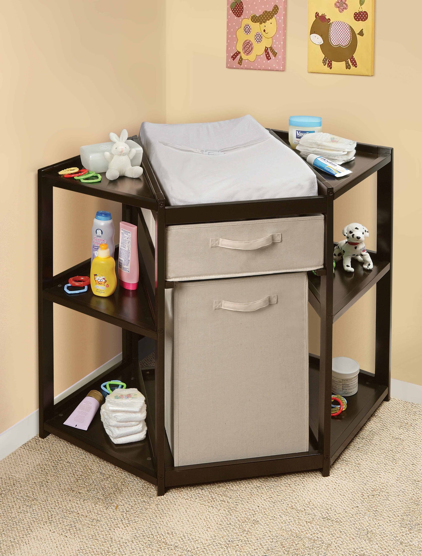 Diaper Corner Baby Changing Table with Hamper and Basket - Lifestyle Image Inclined Front View of Diaper Corner Baby Changing Table with Open Hamper and Basket Espresso