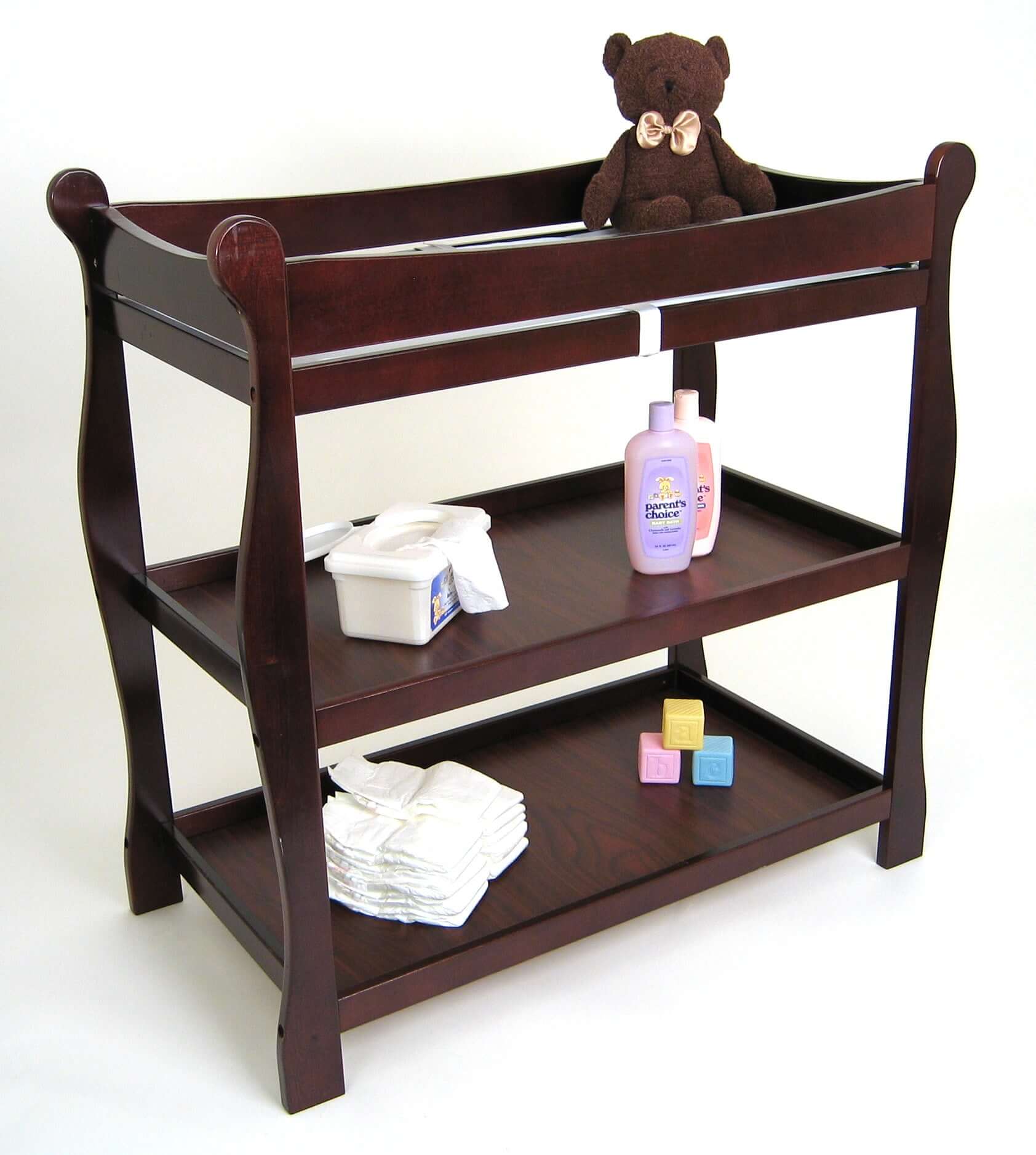 Sleigh Style Baby Changing Table - Inclined Side View of Sleigh Style Baby Changing Table Cherry In Usage