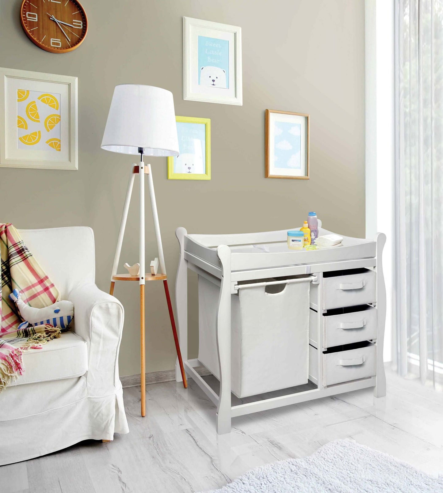 Sleigh Style Baby Changing Table with Hamper and 3 Baskets - Lifestyle Image Inclined Side View of Open Drawer Sleigh Style Baby Changing Table with Hamper and 3 Baskets White