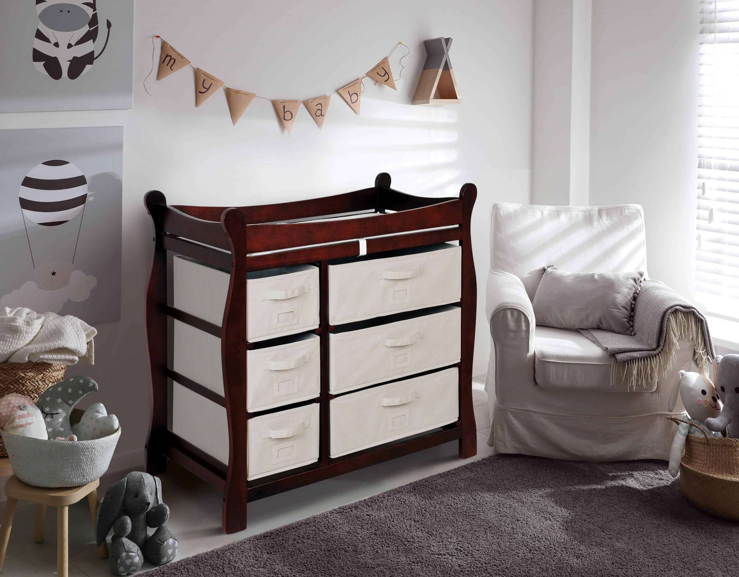 Sleigh Style Baby Changing Table with 6 Baskets -Lifestyle Image Inclined Side View of Sleigh Style Baby Changing Table with 6 Baskets Cherry