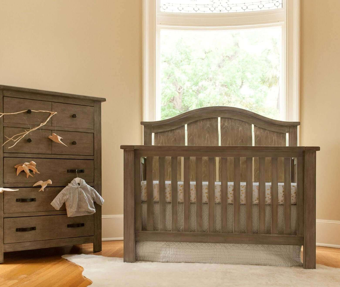 Relic Arch 4-in-1 Convertible Crib - Lifestyle Image Front View of Adult Full Size Bed Fossil