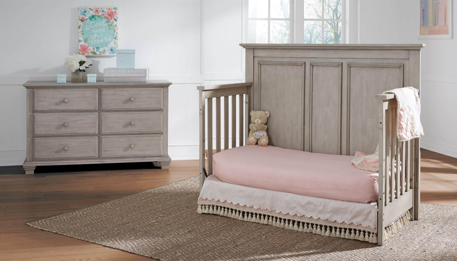 Kenilworth 4-in-1 Convertible Crib - Lifestyle Image Inclined Side View of Kenilworth Daybed Stone Wash