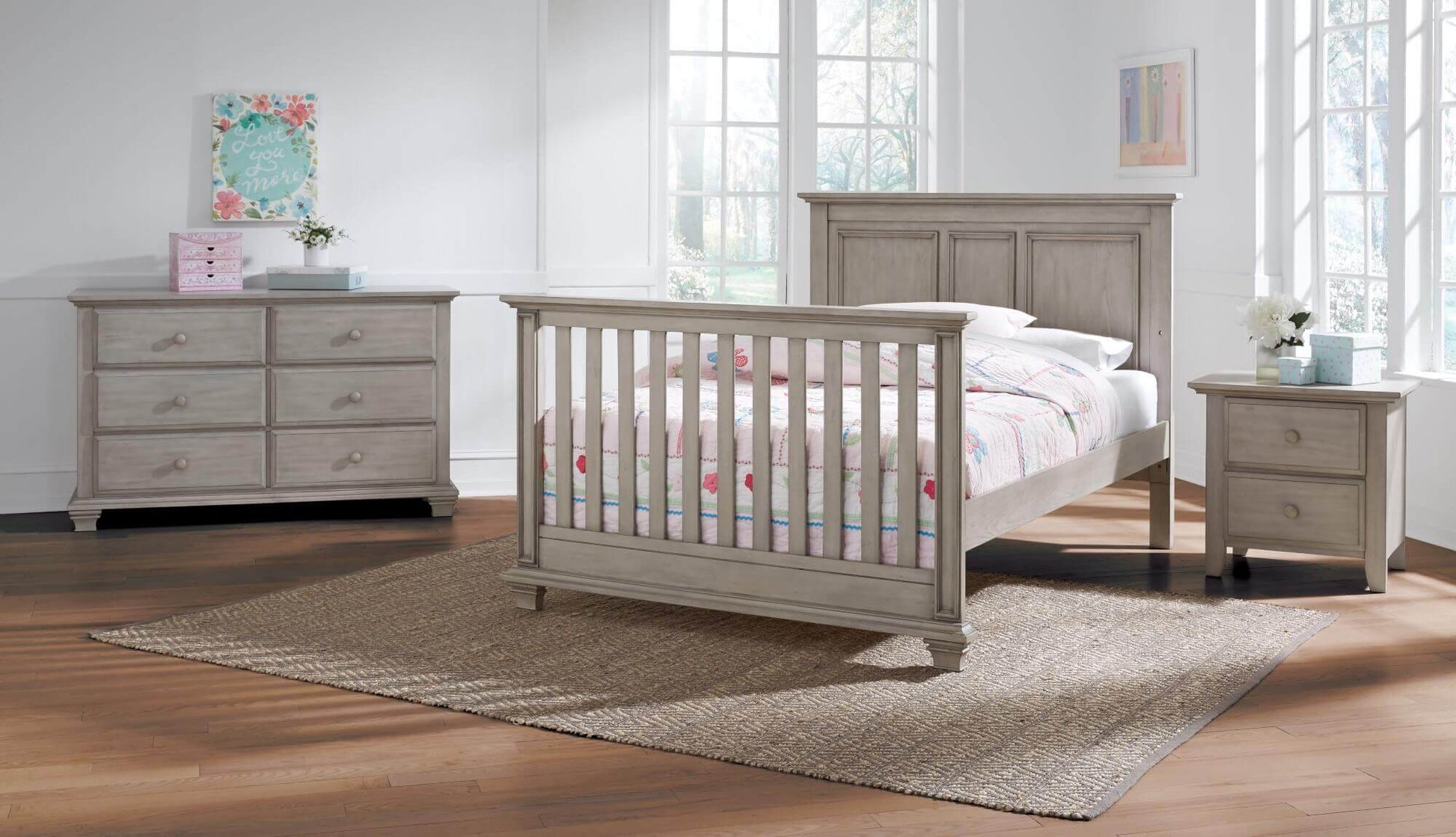 Kenilworth 4-in-1 Convertible Crib - Lifestyle Image Inclined Side View of Kenilworth Full Sized Bed Stone Wash