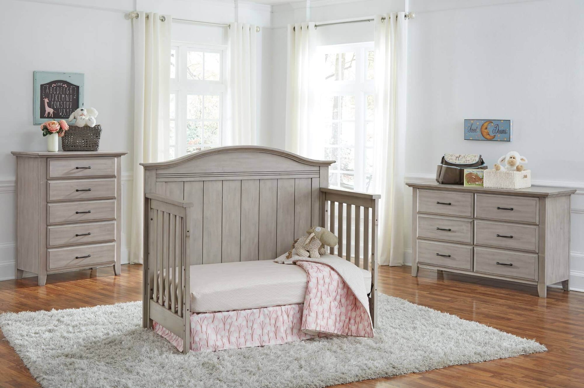 Chandler 4 In 1 Convertible Crib - Lifestyle Image Inclined Side View of Chandler Daybed Stone Wash