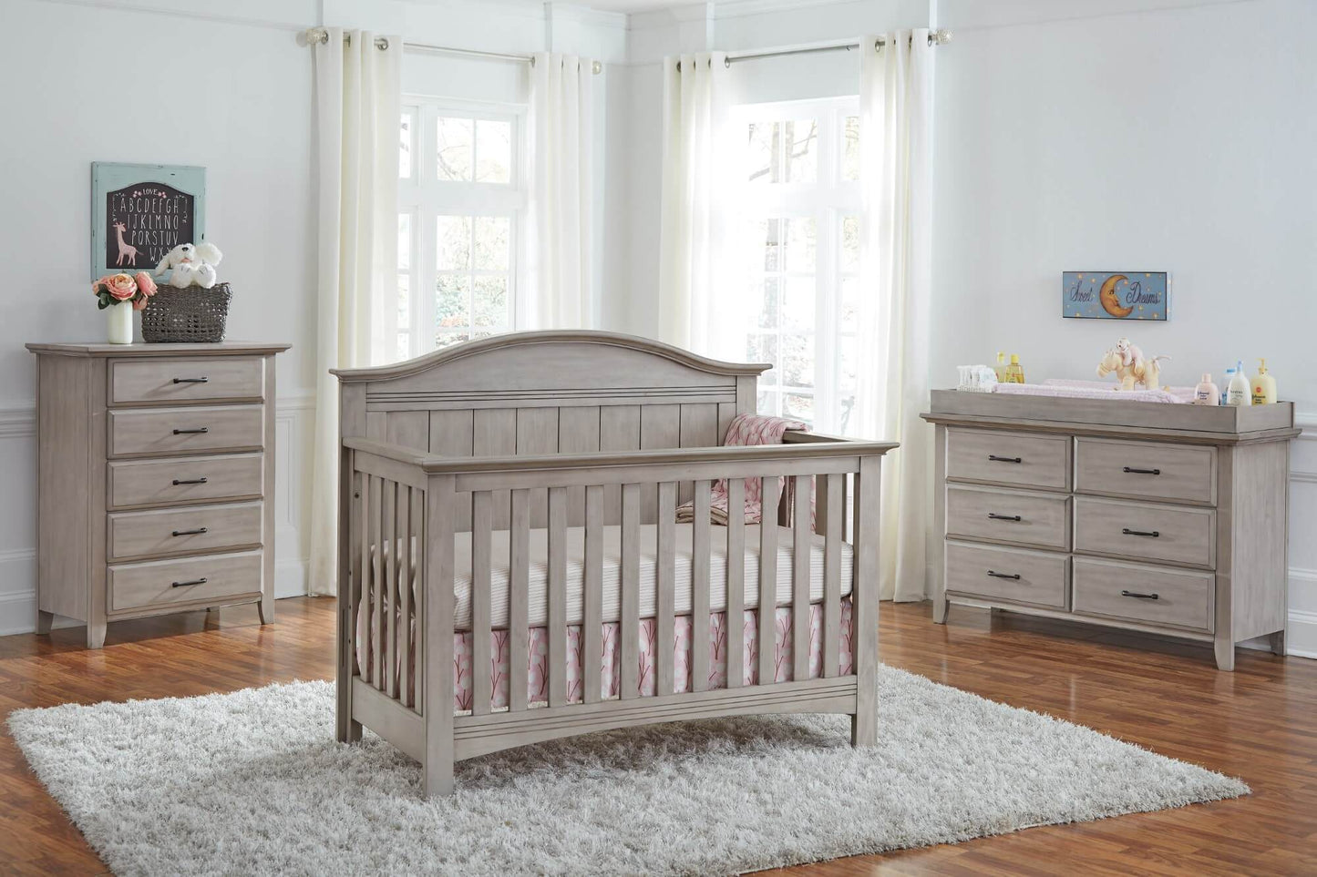 Chandler 4 In 1 Convertible Crib - Lifestyle Image Inclined Side View of Chandler 4 In 1 Convertible Crib Stone Wash