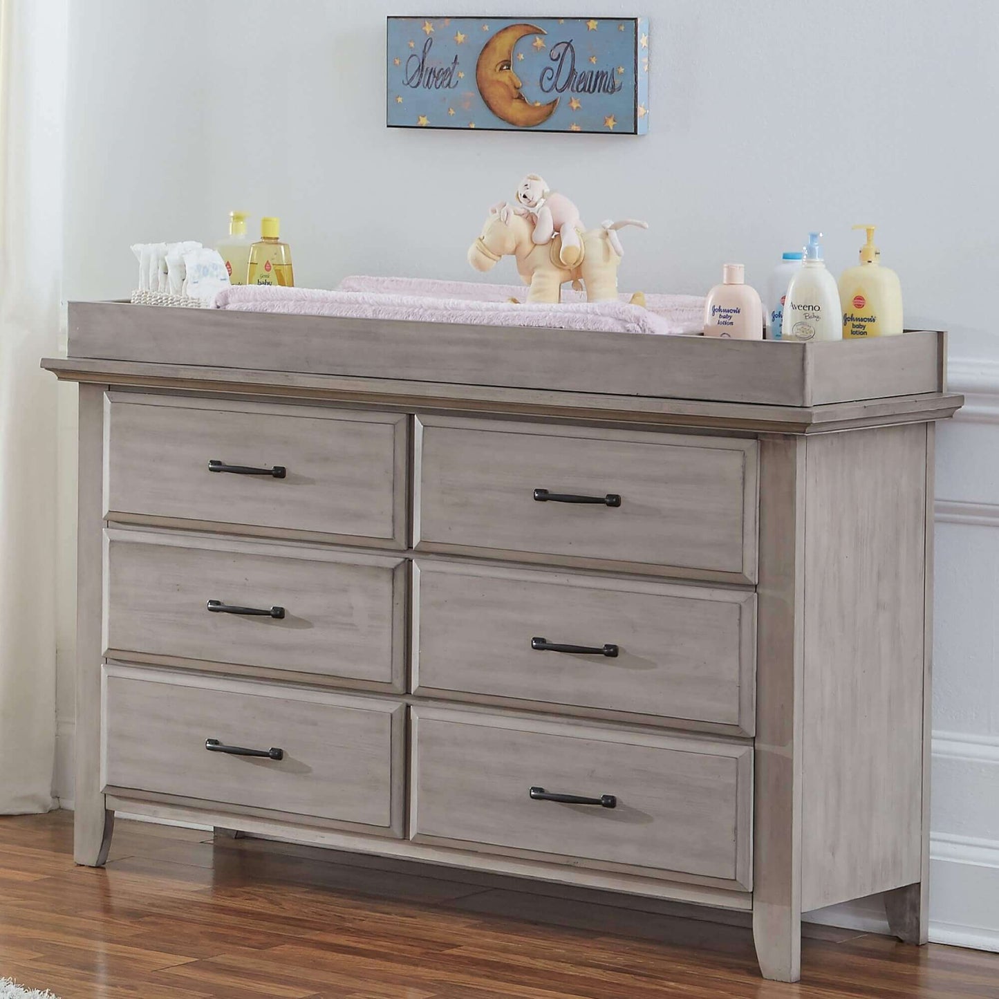 Chandler 6 Drawer Dresser - Lifestyle Image Inclined Side View of Chandler 6 Drawer Dresser Stone Wash