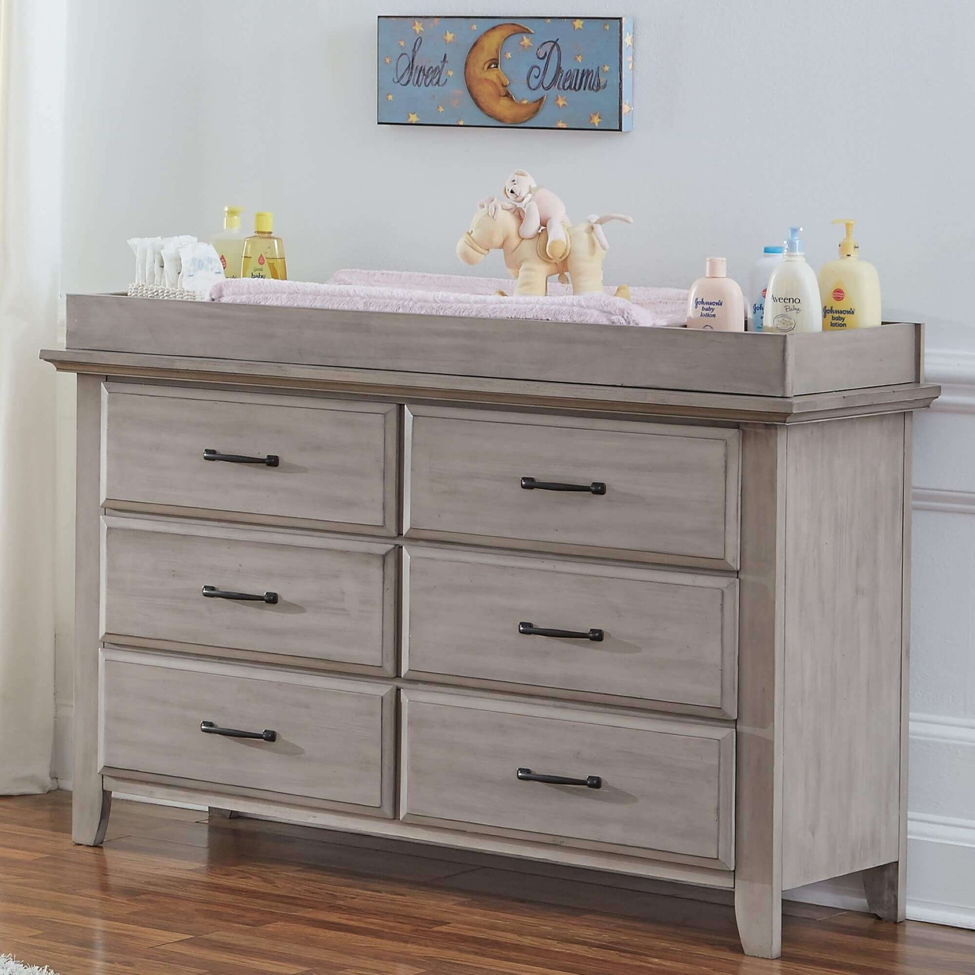 Chandler 6 Drawer Dresser - Lifestyle Image Inclined Side View of Chandler 6 Drawer Dresser Stone Wash