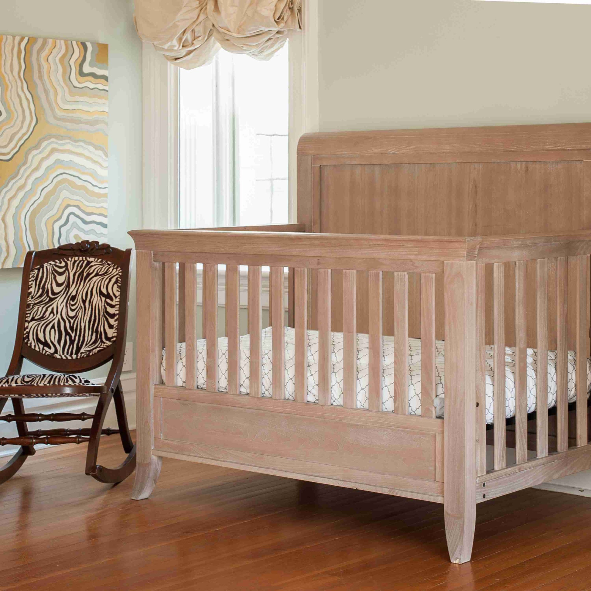 Cameo Sleigh Toddler Bed Conversion Kit - Lifestyle Image Side View of Sleigh Crib Toast