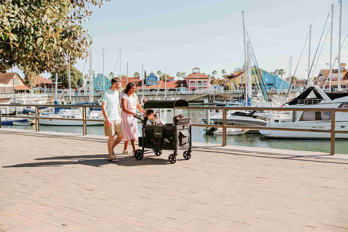 W4 Elite Quad Stroller Wagon - Lifestyle Image of Family Enjoying with W4 Elite Quad Stroller Wagon Black Camo