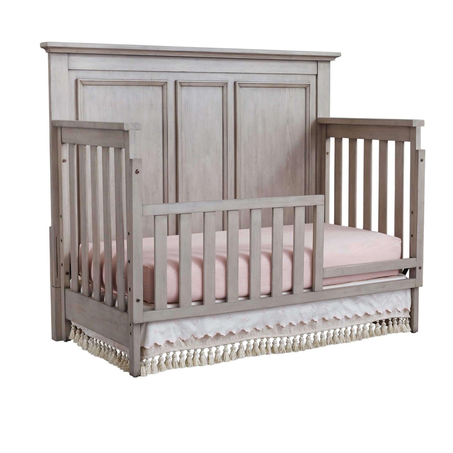 Kenilworth 4-in-1 Convertible Crib - Inclined Side View of Kenilworth 4-in-1 Convertible Crib Stone Wash with Guard Rail