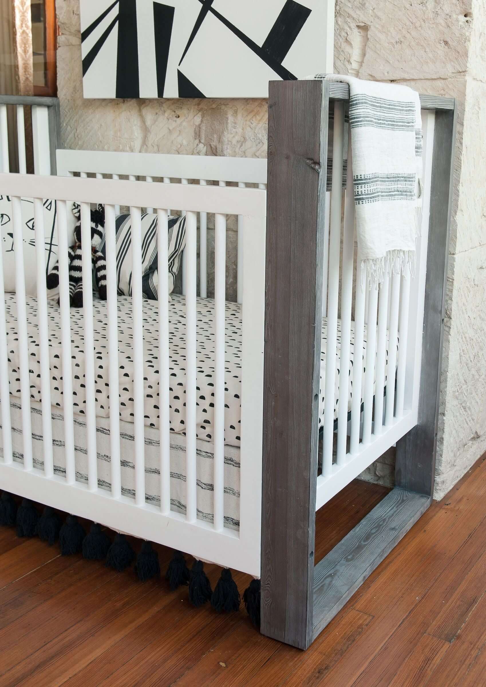 True Traditional 3 in 1 Crib -  Zoomed View Lifestyle Image of Traditional 3 in 1 Crib Mud with Snow