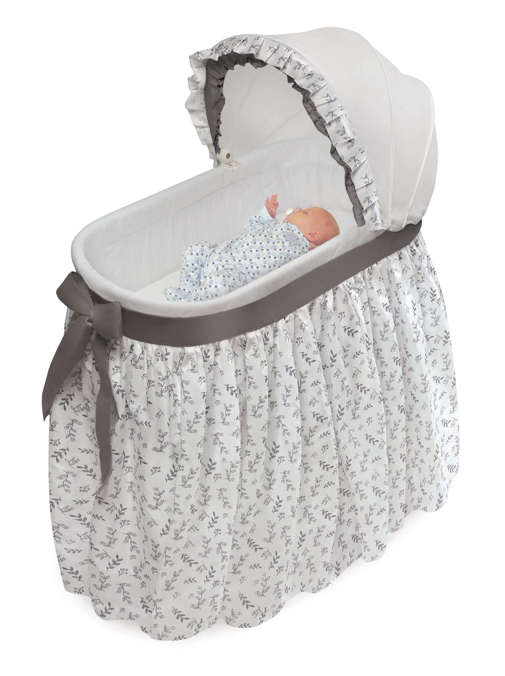 Wishes Oval Bassinet - Inclined Side View of Wishes Oval Bassinet White with the Baby Inside