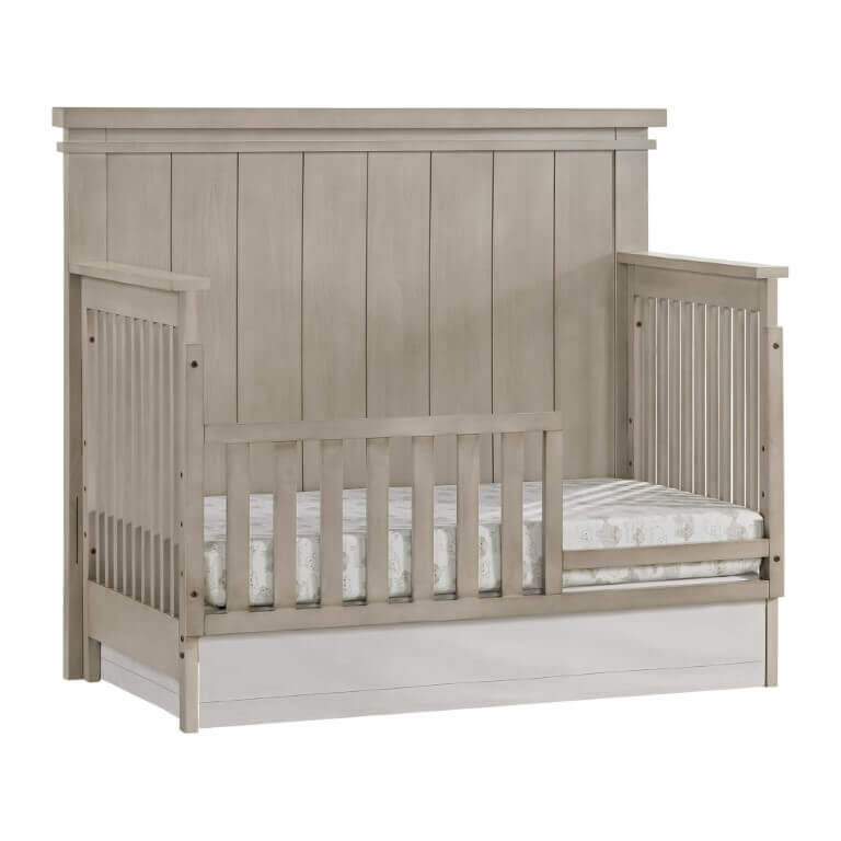 Hampton 4 In 1 Convertible Crib - Inclined Side View of Hampton 4 In 1 Convertible Crib Stone Wash with Guard Rail