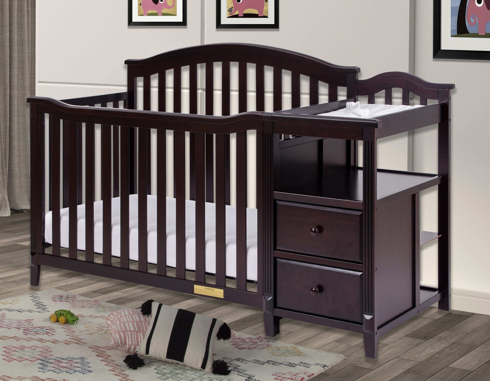 Kali 4-in-1 Crib and Changer - Lifestyle Image Inclined Side View of Kali 4-in-1 Crib and Changer Espresso