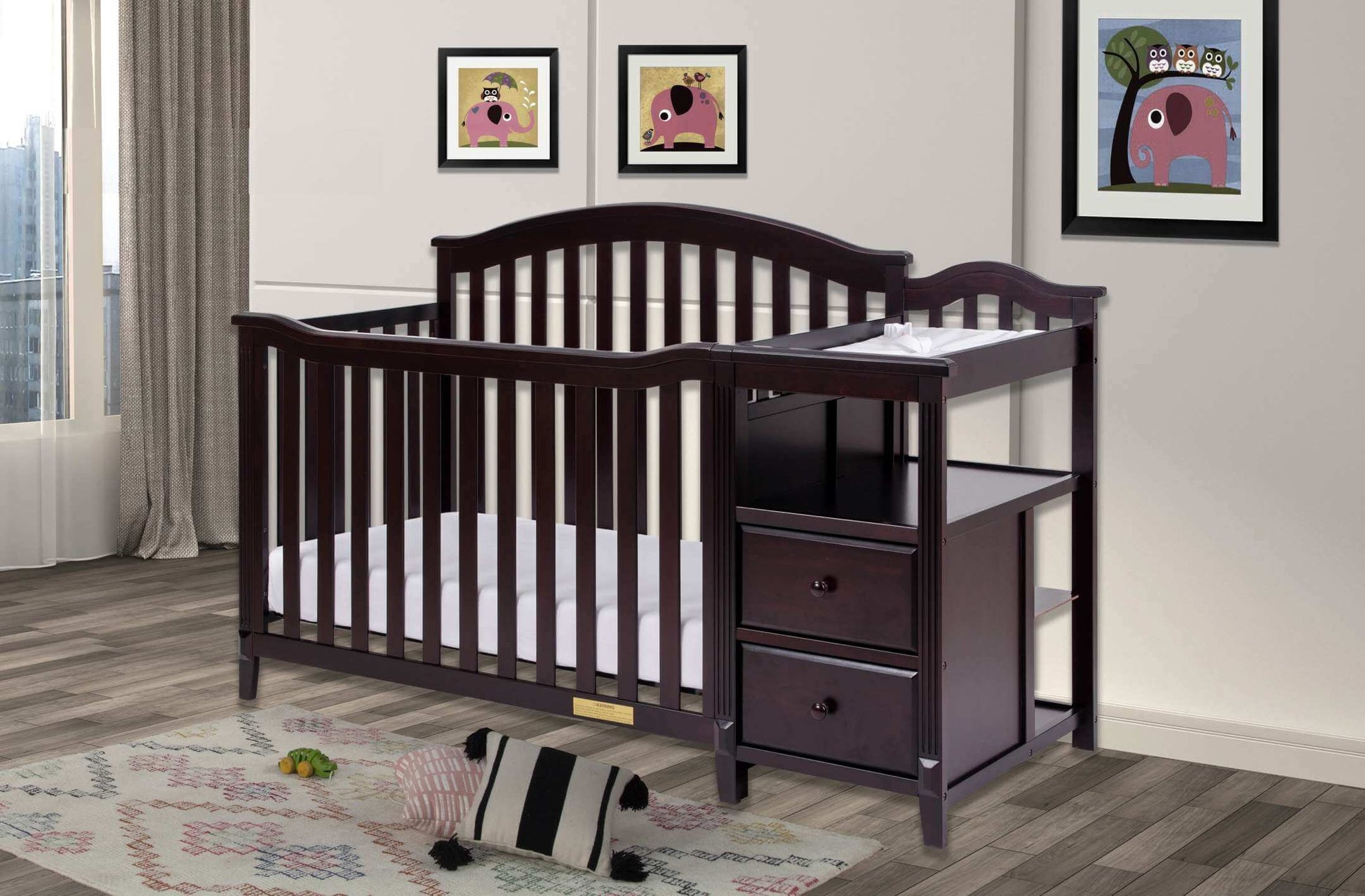 Kali 4-in-1 Crib and Changer - Full Lifestyle Image Inclined Side View of Kali 4-in-1 Crib and Changer Espresso