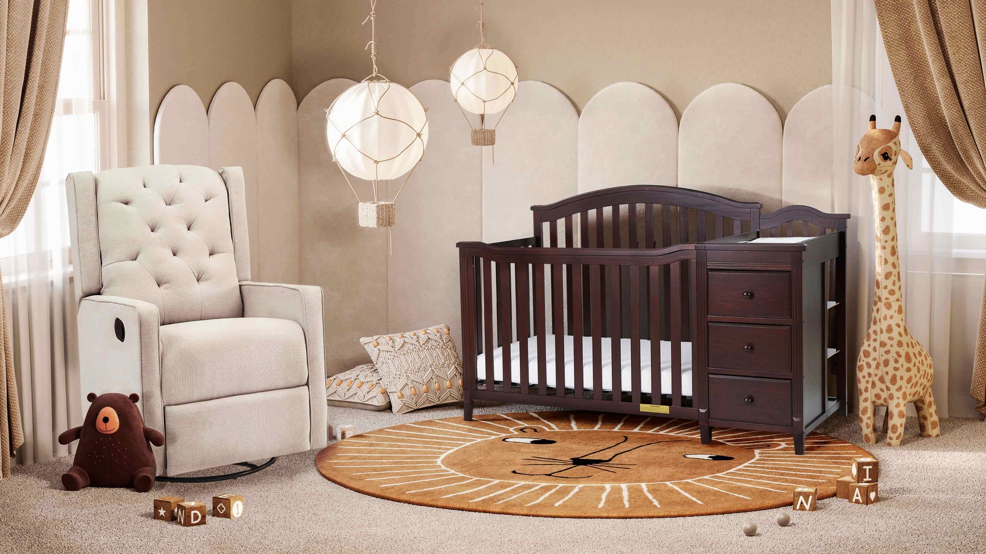 Kali II 4-in-1 Crib and Changer - Lifestyle Image Inclined Side View of Kali II 4-in-1 Crib and Changer Espresso with Glider Chair