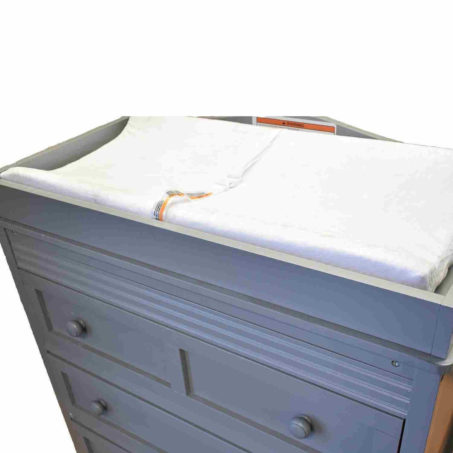 Contoured Changing Pad Fabric Cover - Installed Mattress Top Inclined View