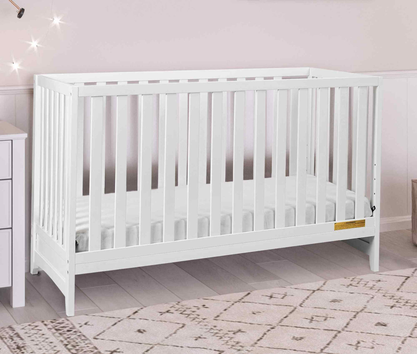 Mila II 3-in-1 Convertible Crib - Lifestyle Image Inclined Side View of Mila II 3-in-1 Convertible Crib White