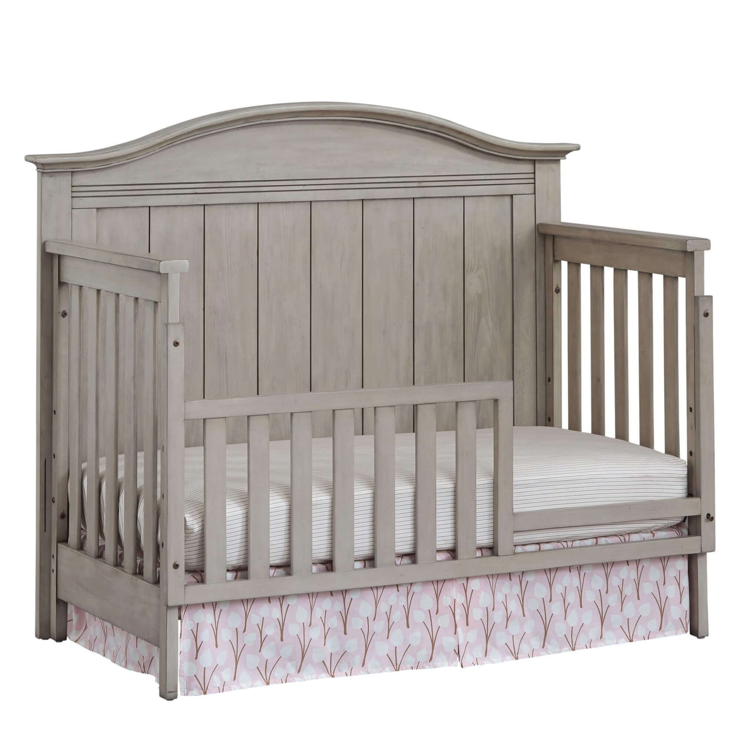 Chandler 4 In 1 Convertible Crib - Inclined Side View of Chandler 4 In 1 Convertible Crib Stone Wash with Guard Rail