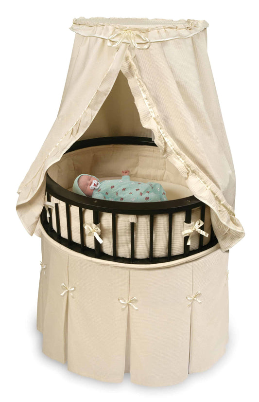 Elite Oval Baby Bassinet with Canopy - Inclined Side View of Elite Oval Baby Bassinet with Canopy Espresso
