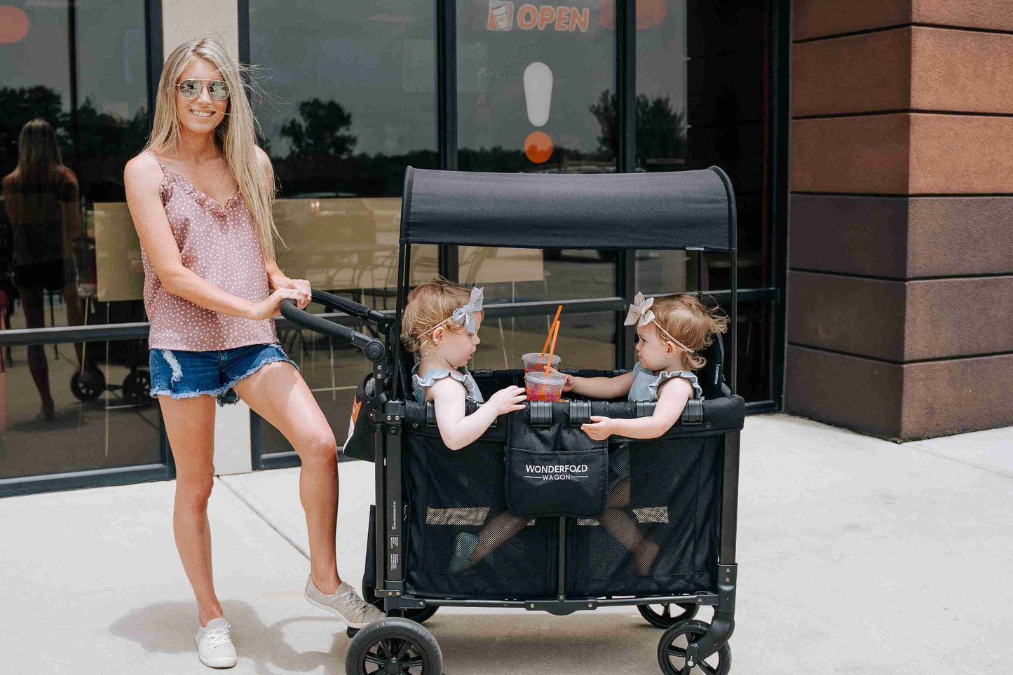 W2 Original + Double Stroller Wagon - Lifestyle Image of Mother Toddler on W2 Original + Double Stroller Wagon Black