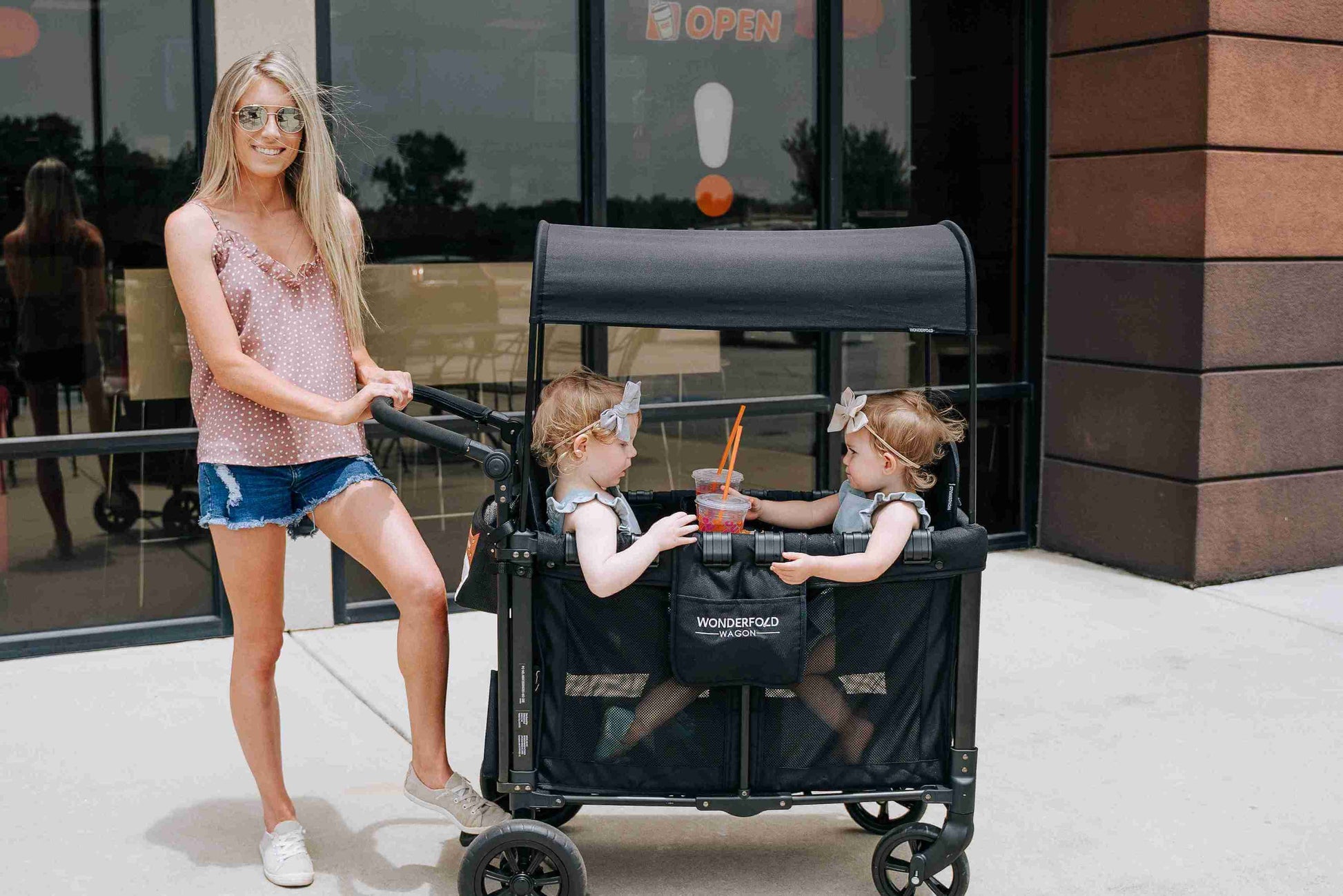 W2 Original + Double Stroller Wagon - Lifestyle Image of Mother Toddler on W2 Original + Double Stroller Wagon Black