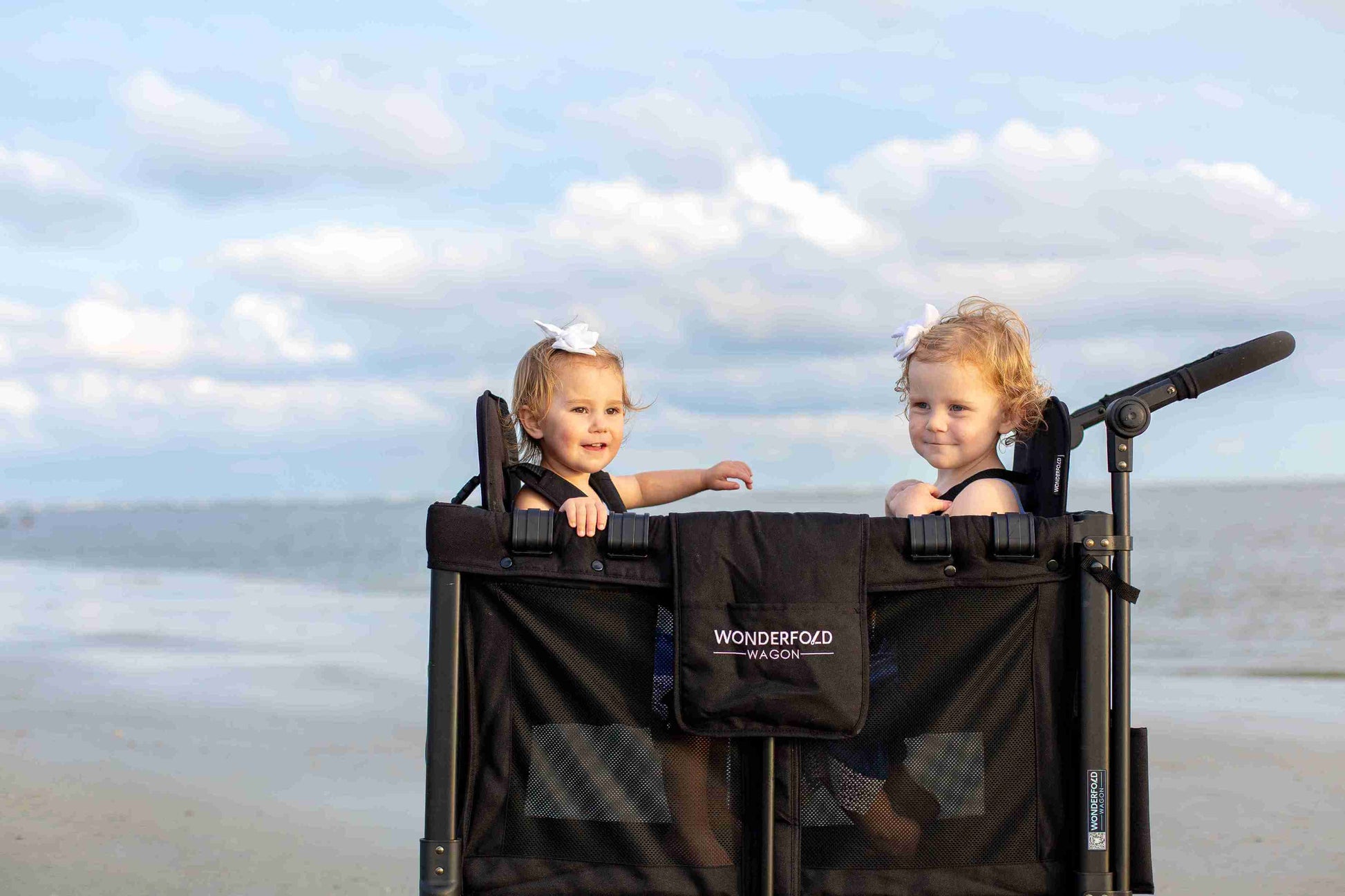 W2 Original + Double Stroller Wagon - Lifestyle Image of Toddler on W2 Original + Double Stroller Wagon Black