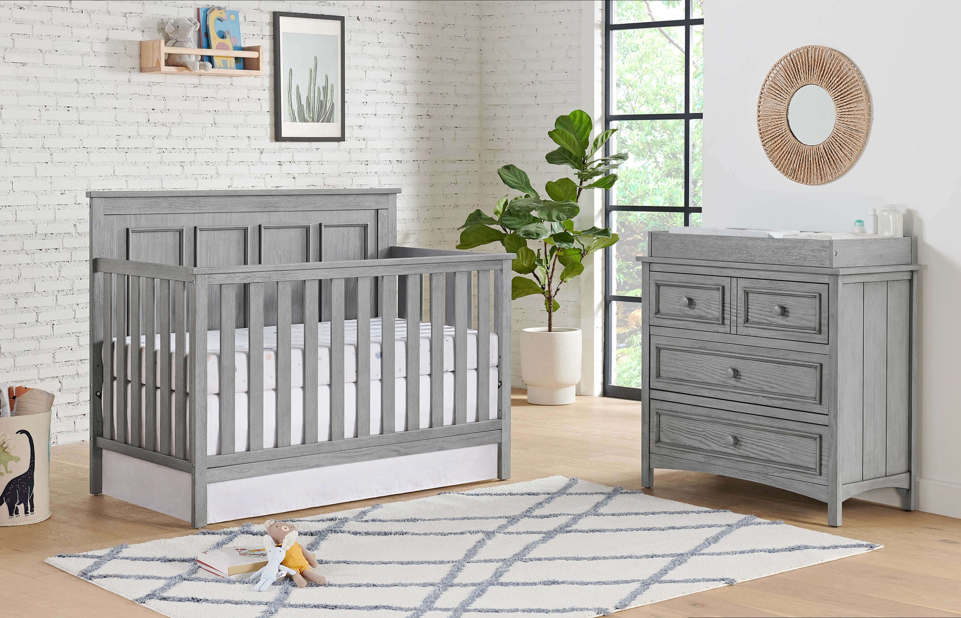 Bennett 4-in-1 Convertible Crib - Lifestyle Image Inclined Side View of Bennett 4-in-1 Convertible Crib Rustic Gray