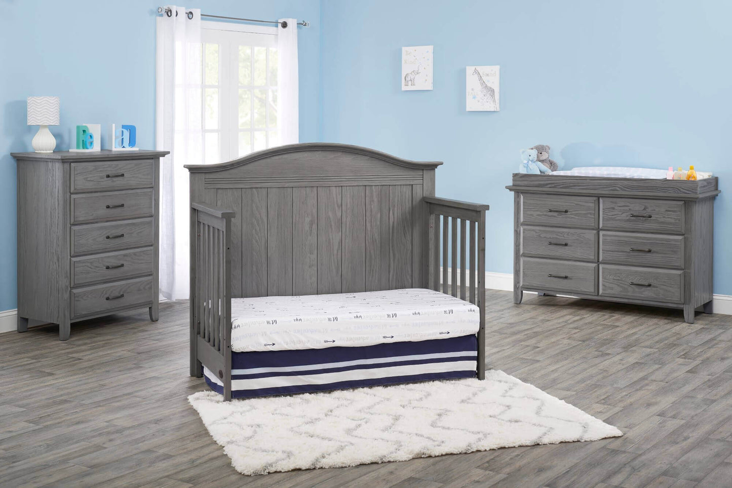 Chandler 4 In 1 Convertible Crib - Lifestyle Image Inclined Side View of Chandler Daybed Graphite Gray