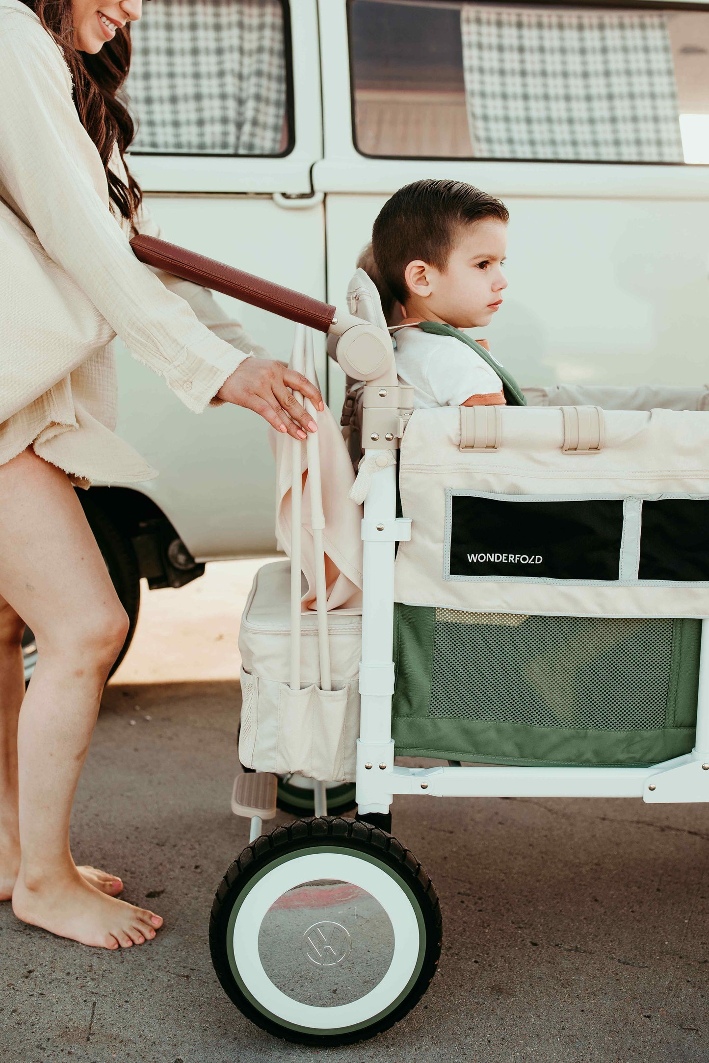 VW4 Volkswagen Stroller Wagon - Lifestyle image Side Zoomed View of the Wagon Green