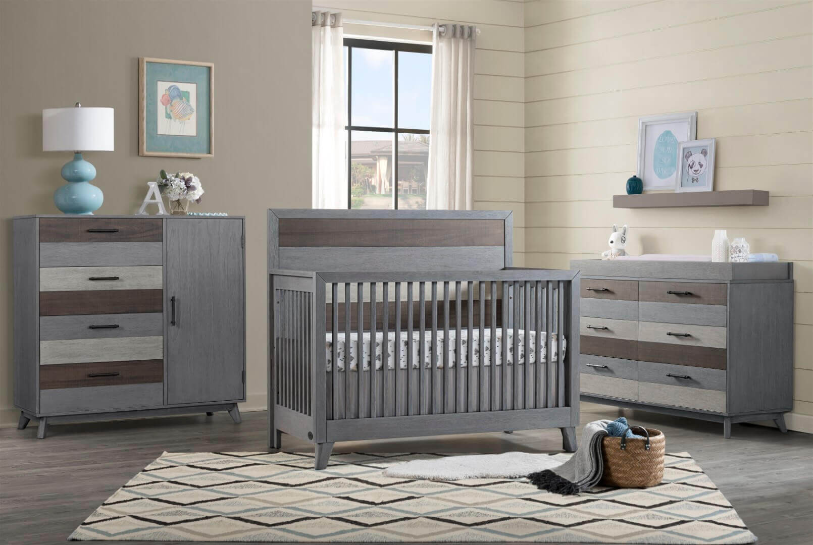 Cascade Chifferobe - Lifestyle Image Side View of Inclined Side View of Cascade Chifferobe Multi Tone Gray Beside Cascade Crib