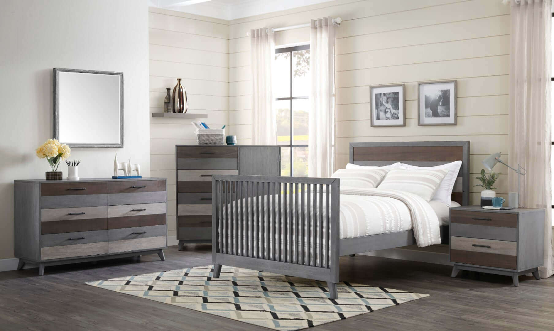 Cascade 6 Drawer Dresser - Lifestyle Image Front of Inclined Side View of Cascade Chifferobe Multi Tone Gray Behind Cascade Crib