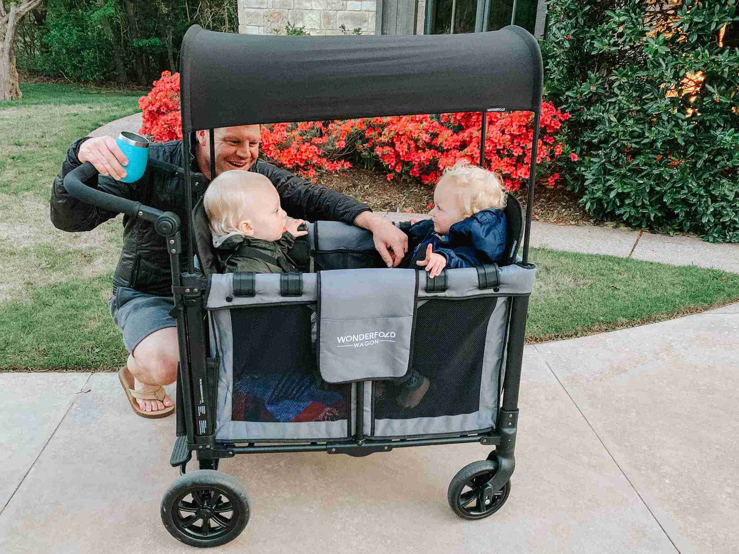 W2 Original + Double Stroller Wagon - Lifestyle Image of Man Playing with Children on W2 Original + Double Stroller Wagon Gray
