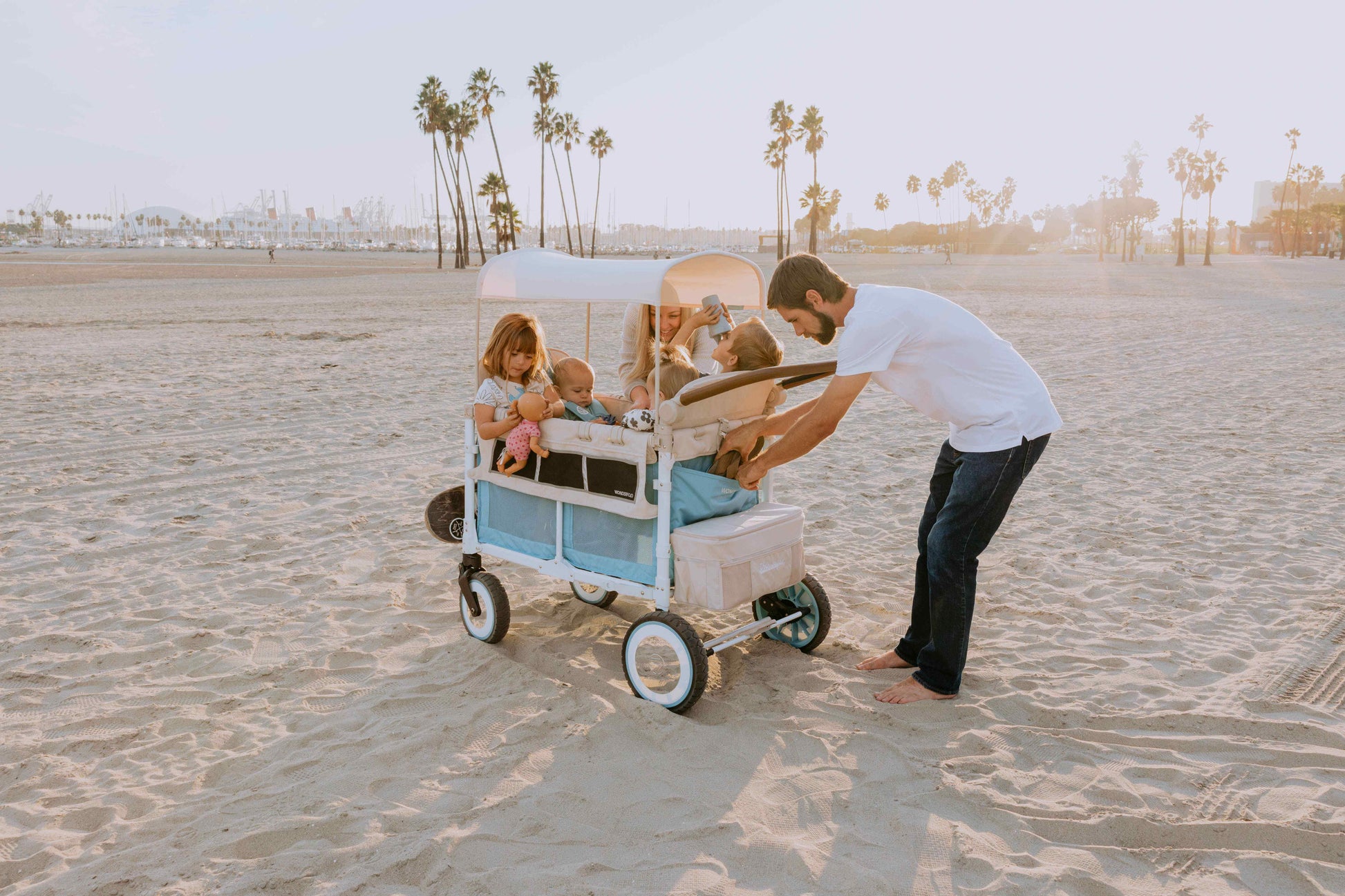 VW4 Volkswagen Stroller Wagon - Lifestyle image Inclined Side View of Wagon Blue