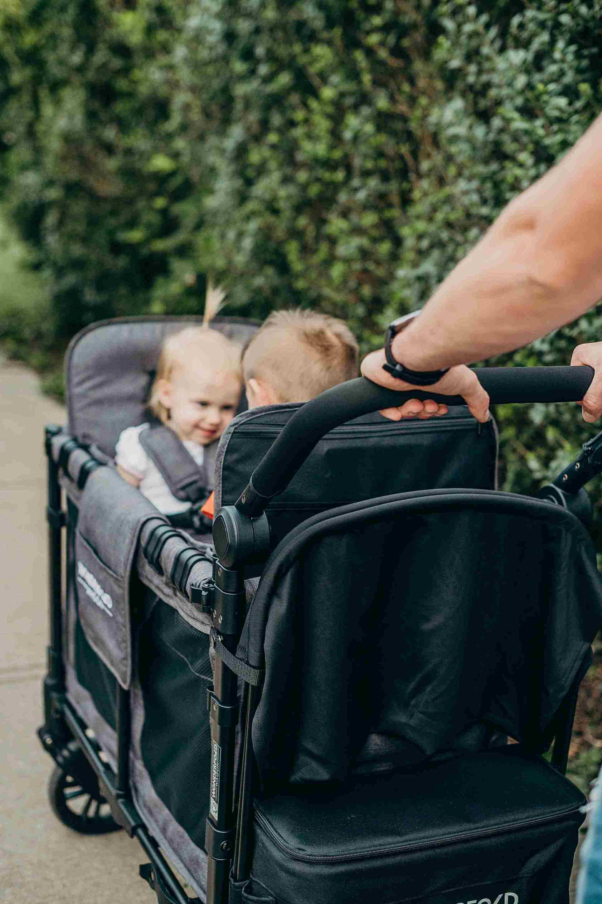 W2 Elite Double Stroller Wagon - Zoomed View Lifestyle Image of W2 Elite Double Stroller Wagon Black