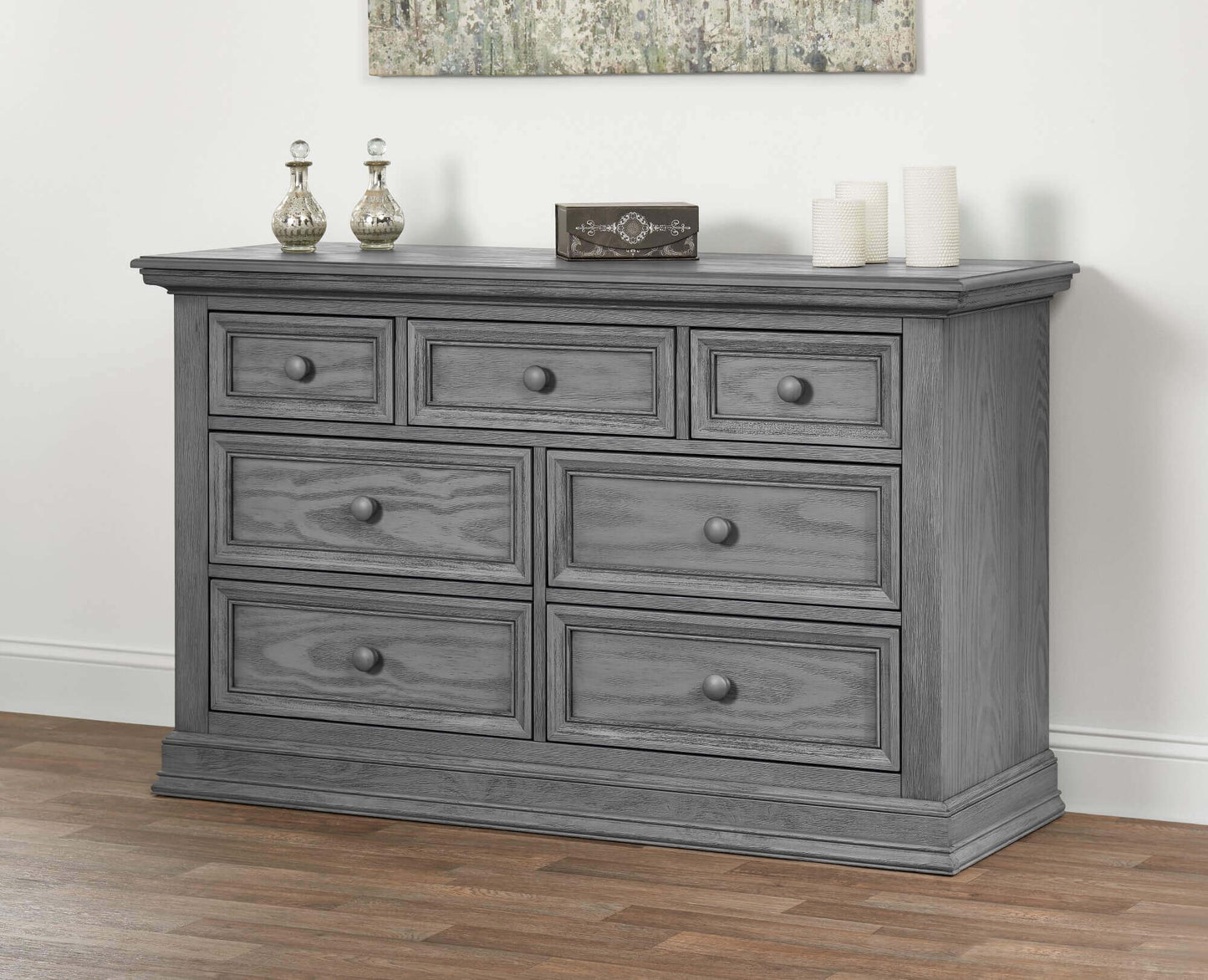 Glenbrook 7 Drawer Dresser - Lifestyle Image  Inclined Side View of Glenbrook 7 Drawer Dresser Graphite Gray