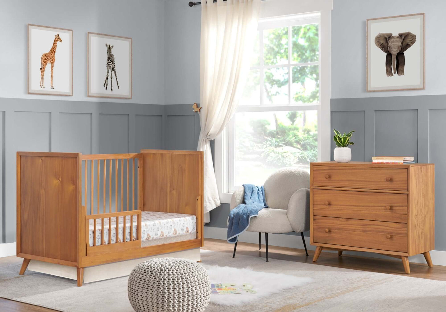 Dawson 3 In 1 Convertible Crib - Inclined Inclined Side View of Dawson 3 In 1 Convertible Crib Honey Brown with Guard Rail on Left
