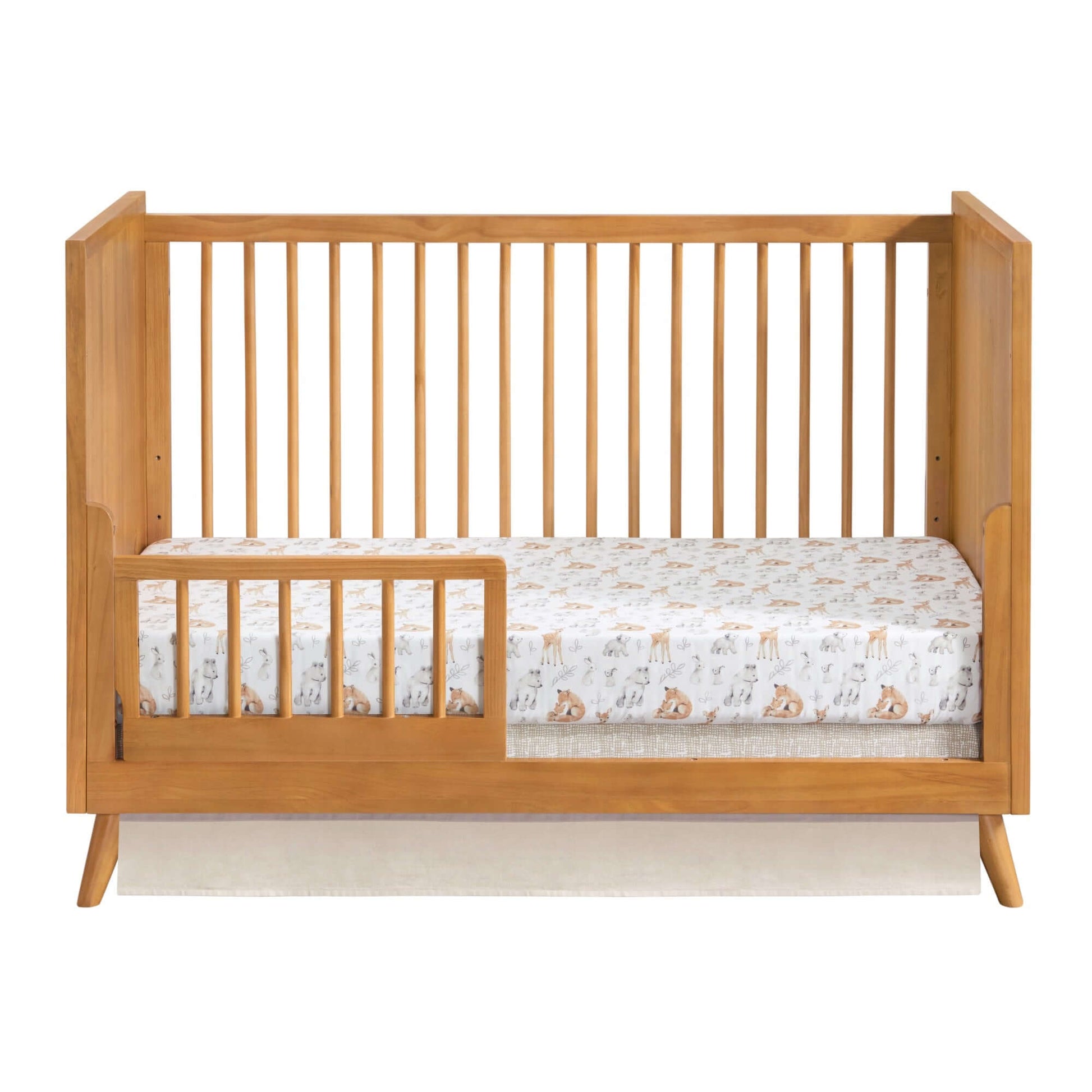 Dawson 3 In 1 Convertible Crib - Front View of Dawson 3 In 1 Convertible Crib Honey Brown with Guard Rail on Left