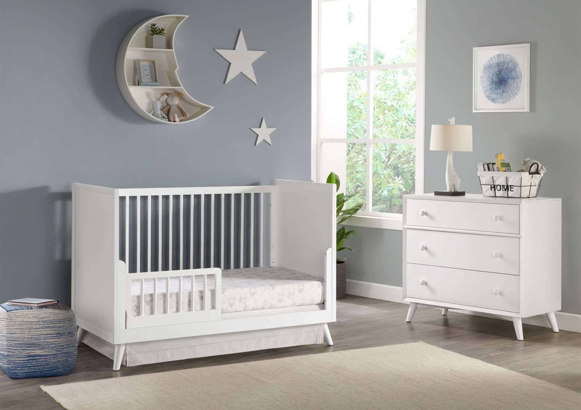 Dawson 3 In 1 Convertible Crib - Inclined Inclined Side View of Dawson 3 In 1 Convertible Crib White with Guard Rail on Left