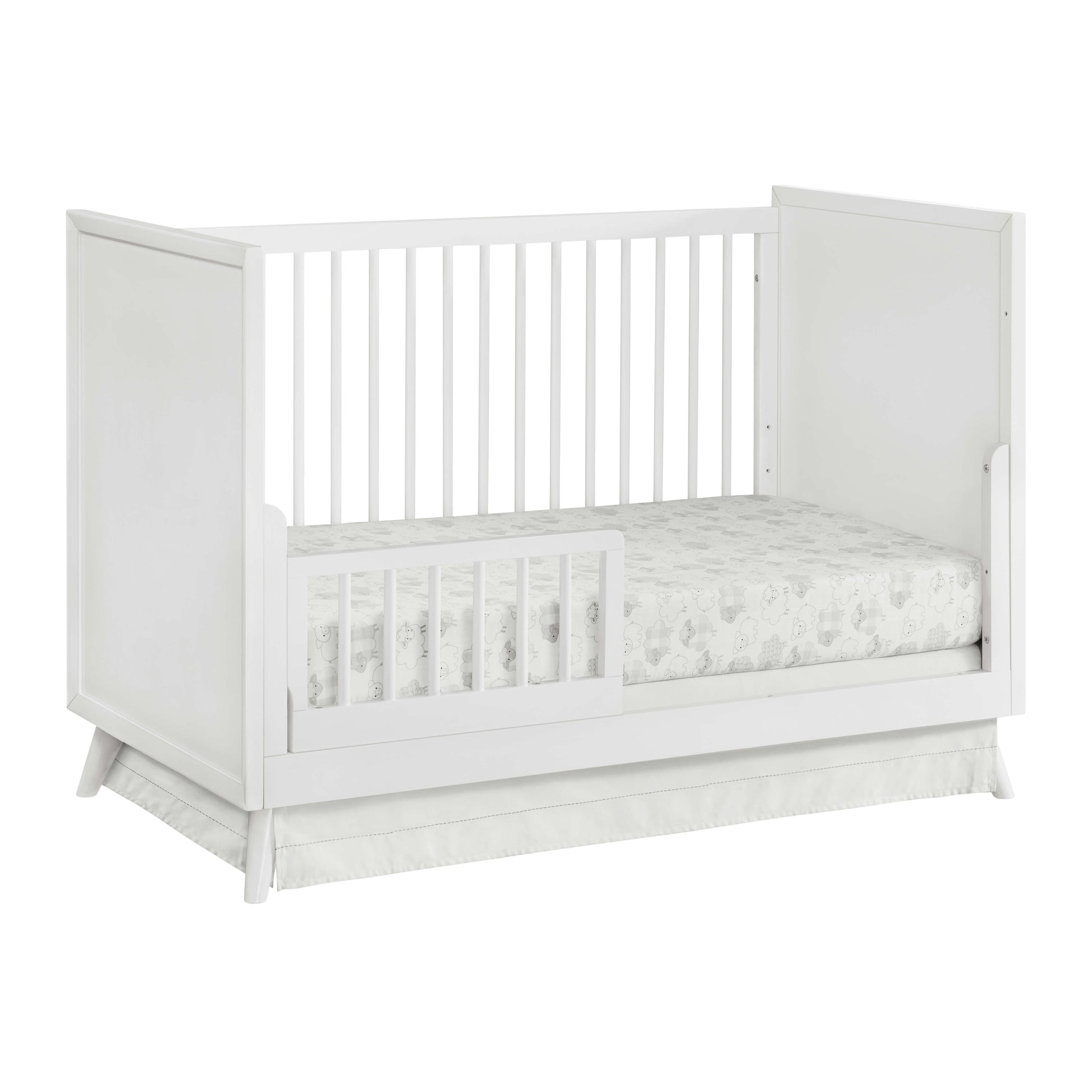 Dawson 3 In 1 Convertible Crib - Inclined Side View of Dawson 3 In 1 Convertible Crib White with Guard Rail on Left