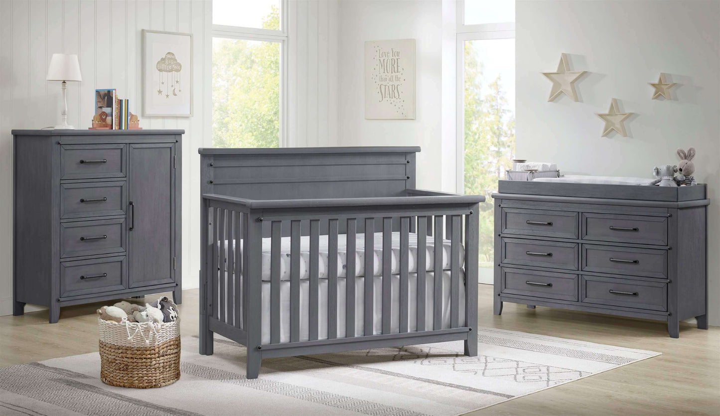 Ellison 4 In 1 Convertible Crib - Lifestyle Image Inclined Side View of Ellison 4 In 1 Convertible Crib Ash Gray with 6 Drawer and Chifferobe