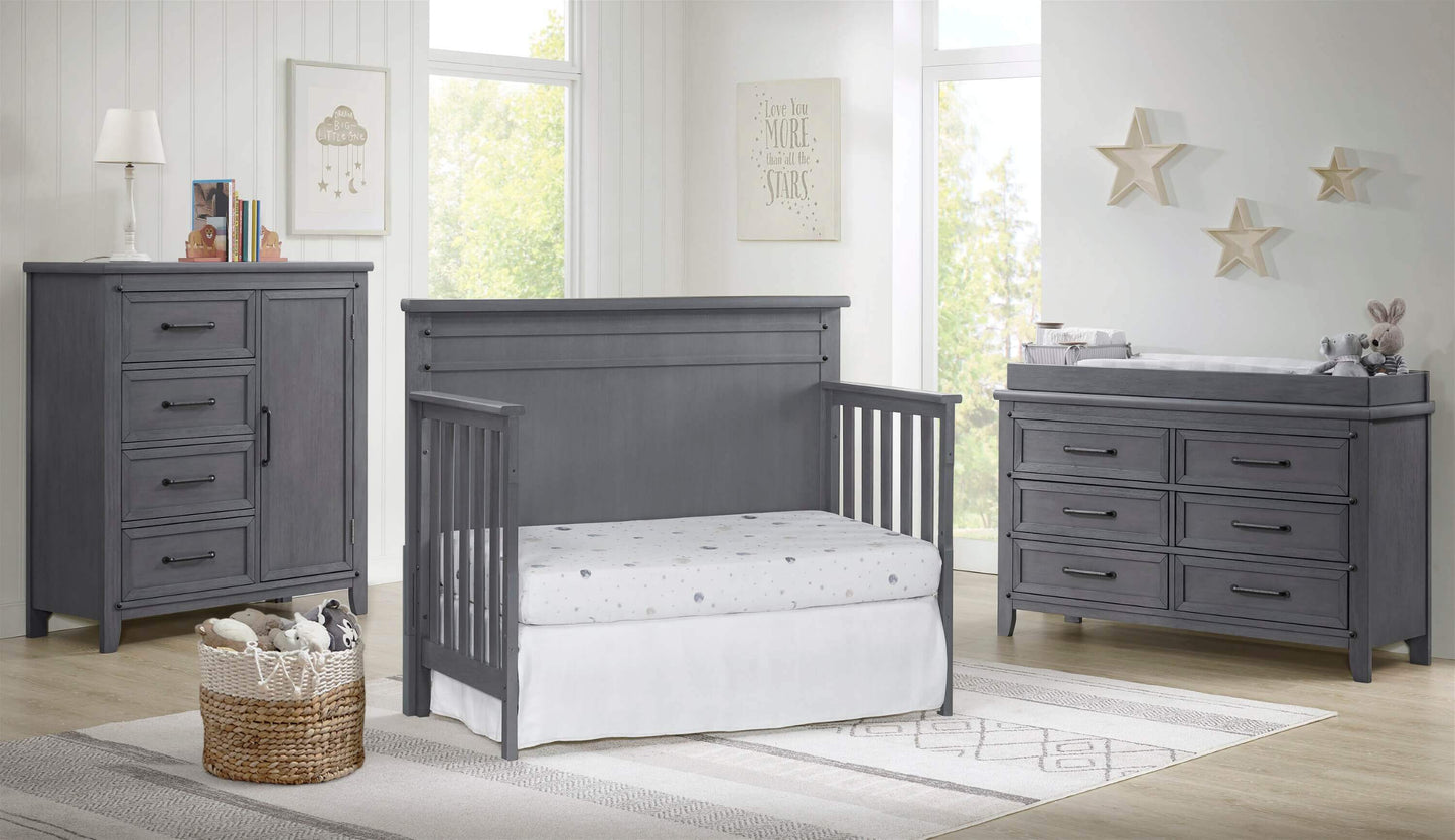 Ellison 4 In 1 Convertible Crib - Lifestyle Image Inclined Side View of Ellison Daybed Ash Gray with 6 Drawer and Chifferobe