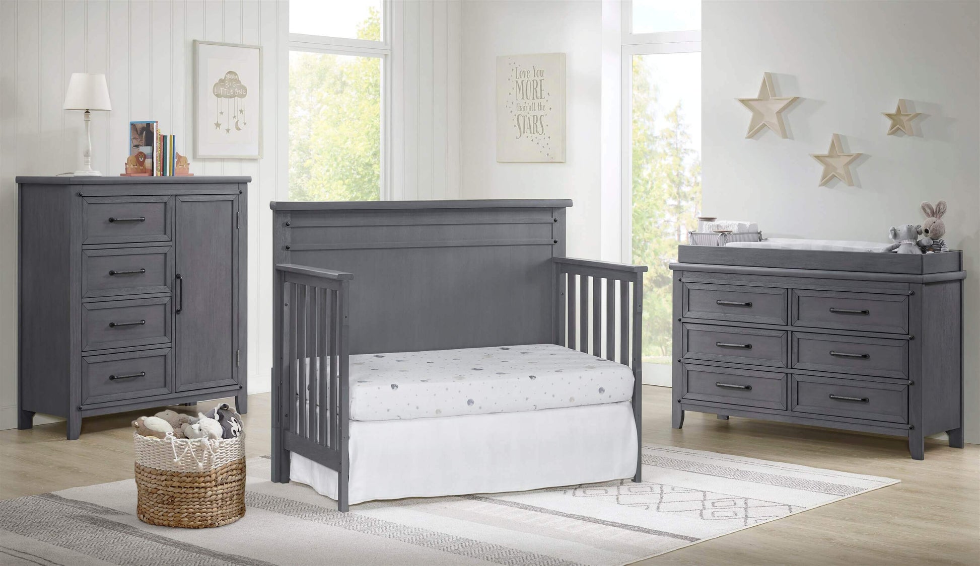 Ellison 4 In 1 Convertible Crib - Lifestyle Image Inclined Side View of Ellison Daybed Ash Gray with 6 Drawer and Chifferobe