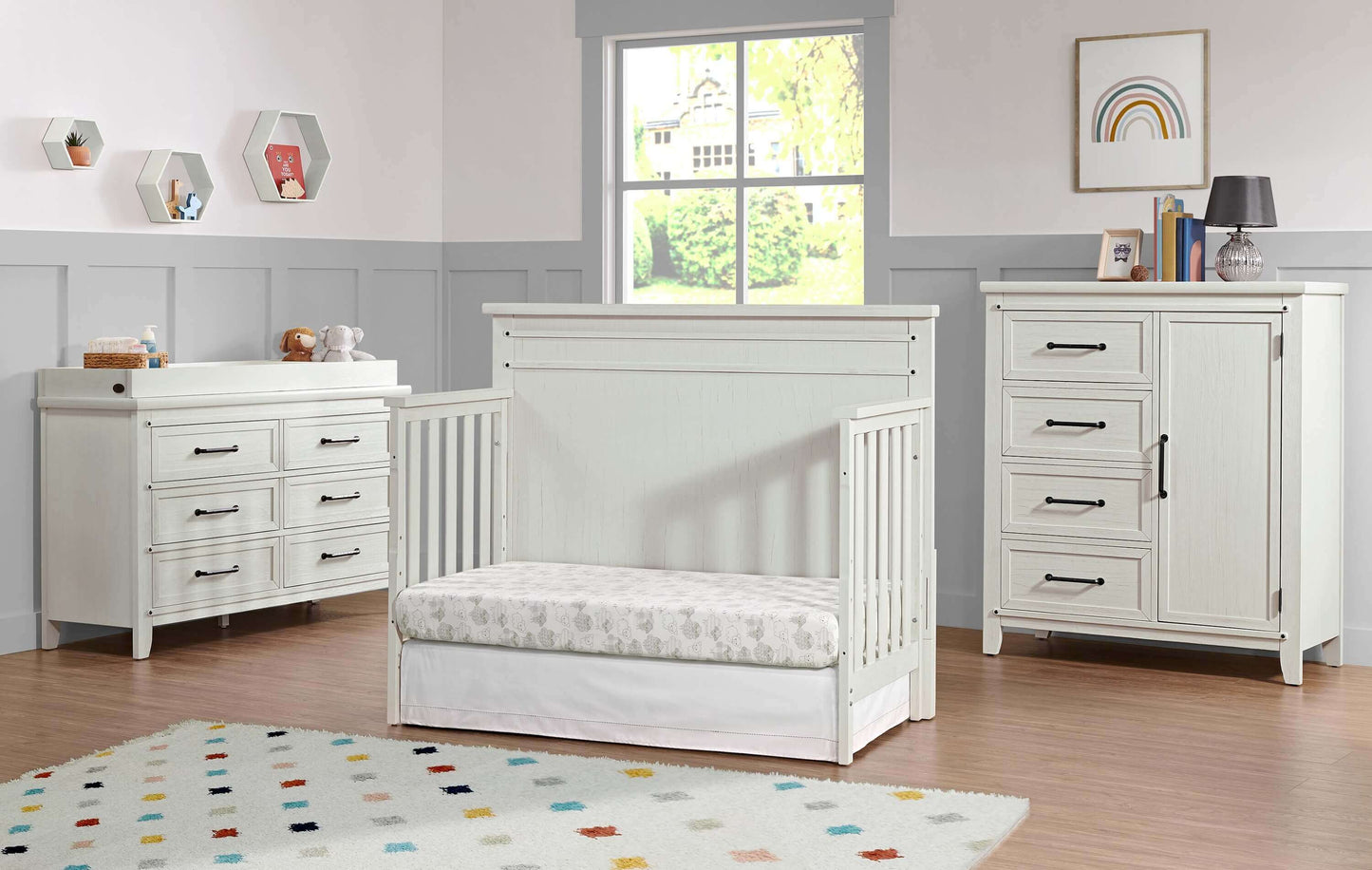 Ellison 4 In 1 Convertible Crib - Lifestyle Image Inclined Side View of Ellison Daybed Rustic White with 6 Drawer and Chifferobe