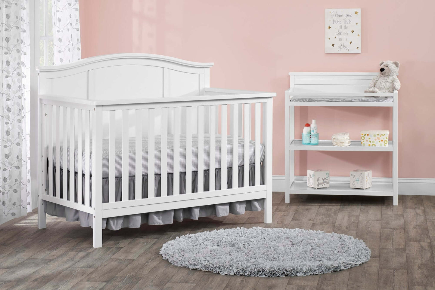 Emerson Guard Rail - Lifestyle Image Inclined Side View of Emerson Crib with Guard Rail White