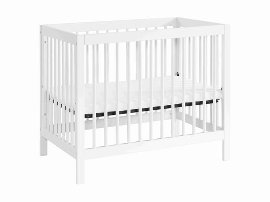 Essential Mini Convertible Crib - Side View of Mini Convertible Crib White