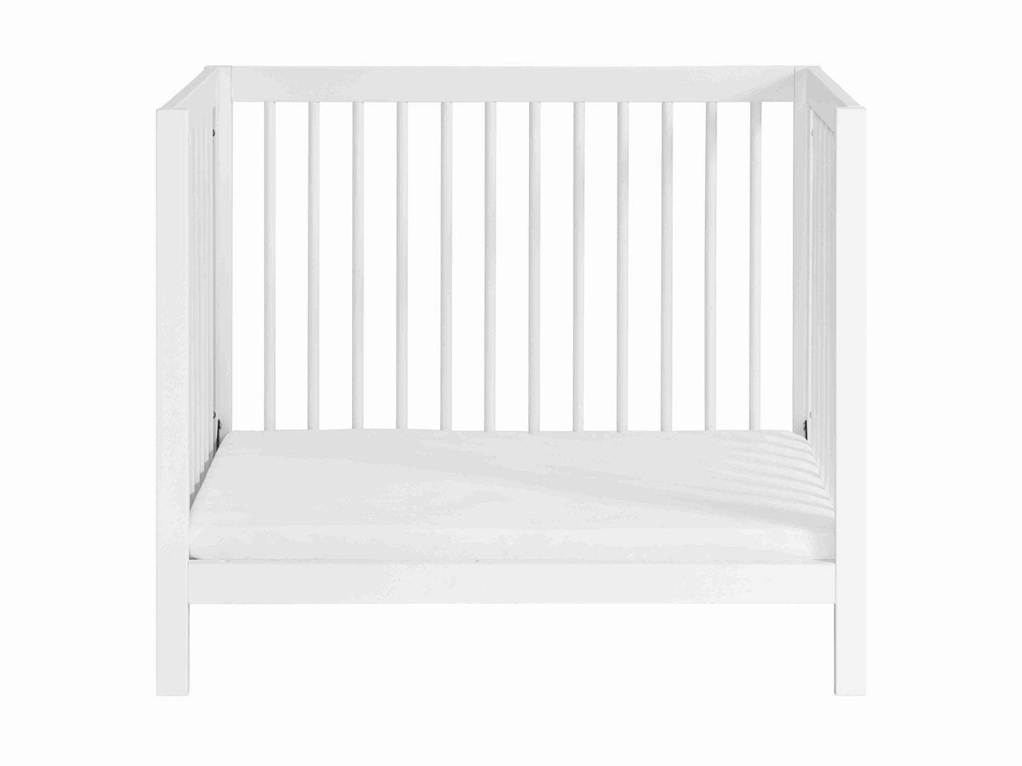Essential Mini Convertible Crib - Front View of Daybed White