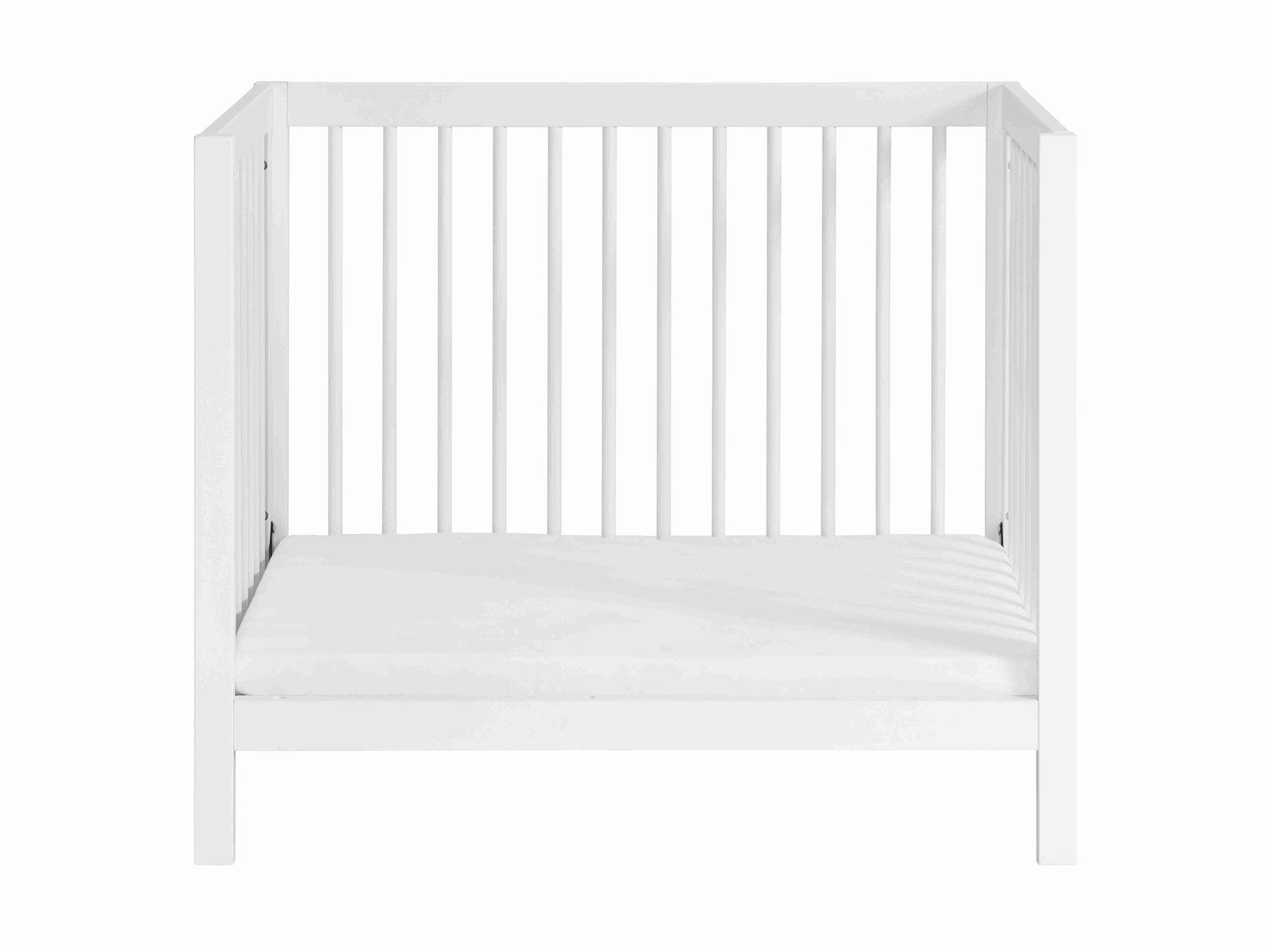 Essential Mini Convertible Crib - Front View of Daybed White